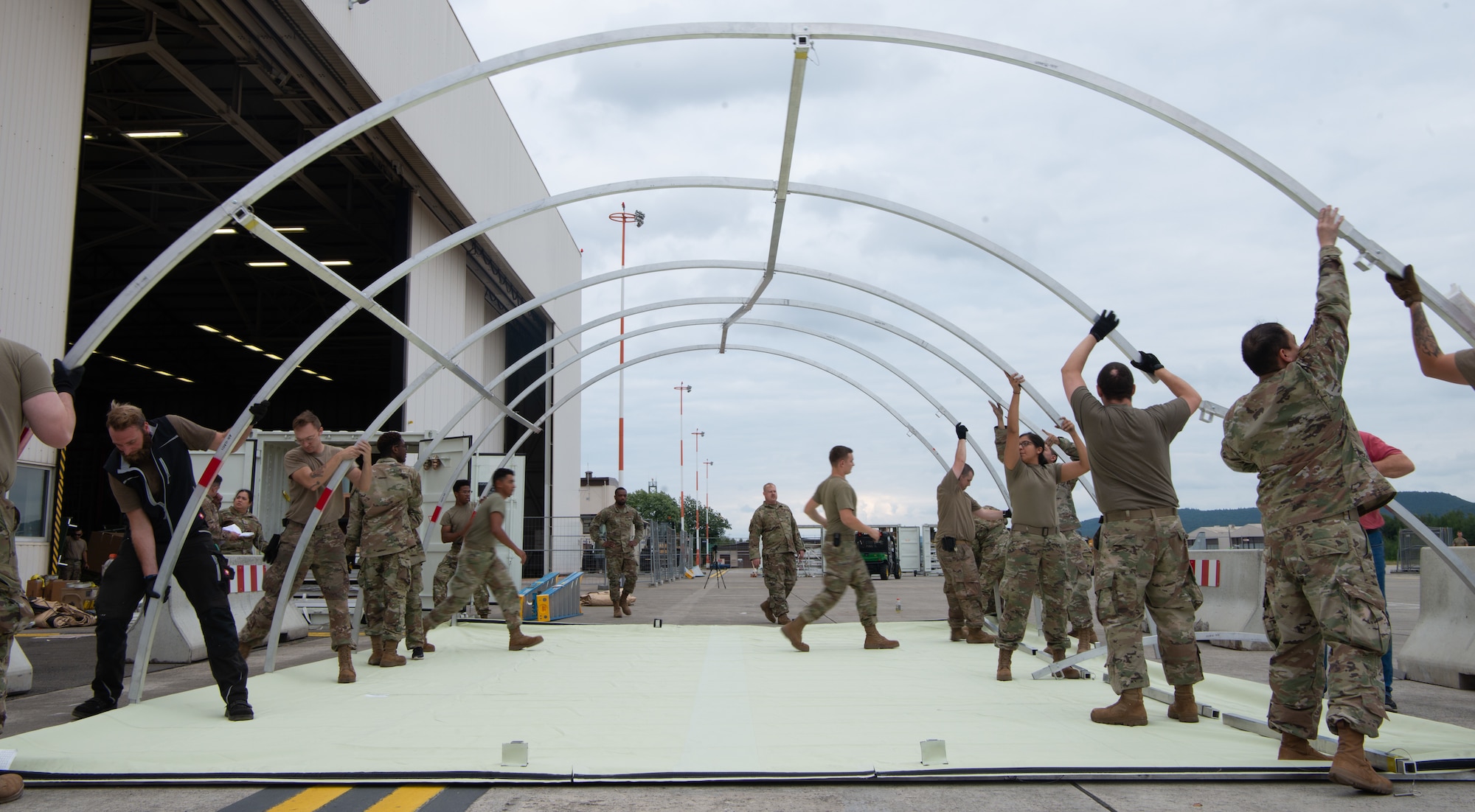 Airmen set up tents.