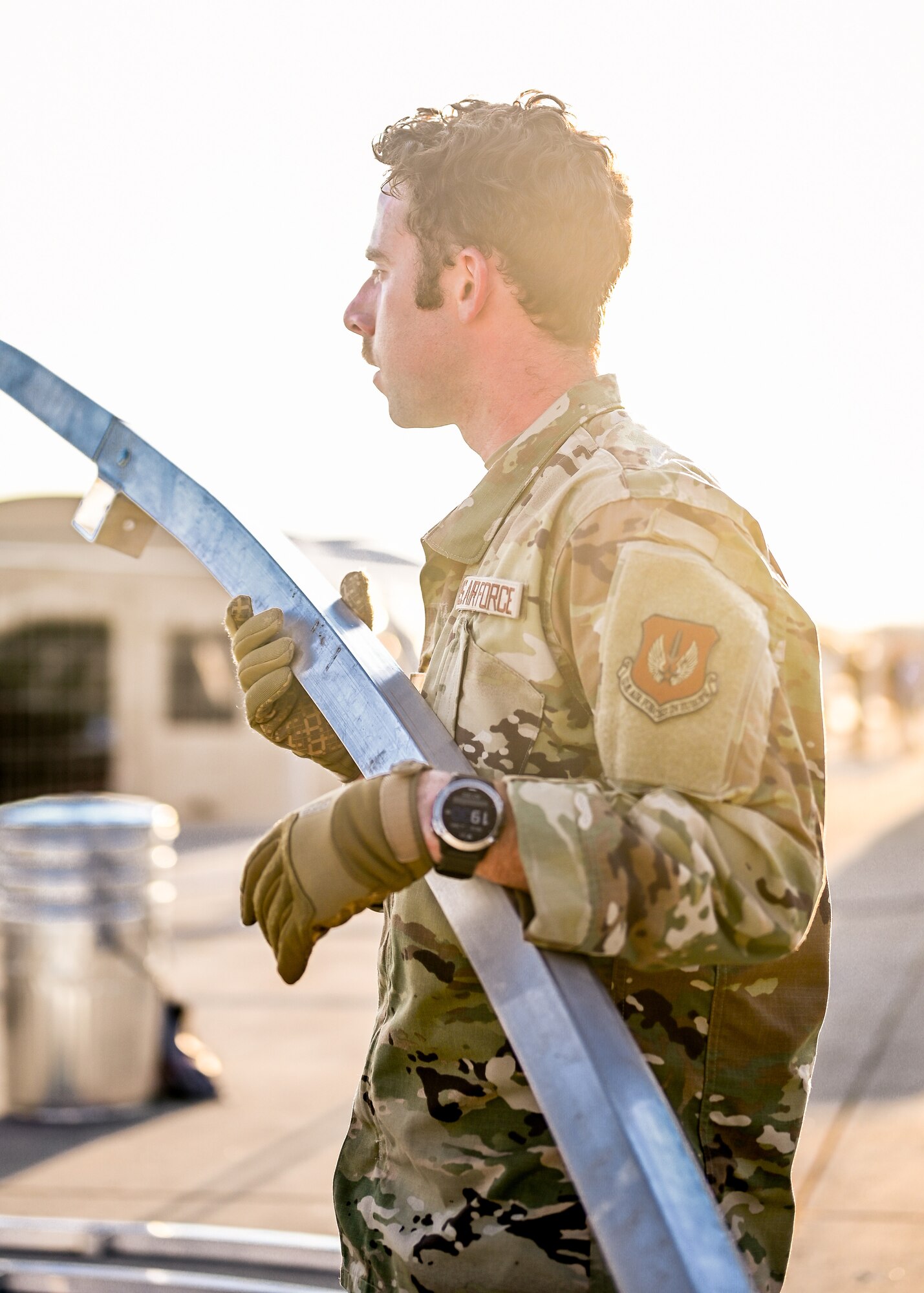 Airman prepares tents.