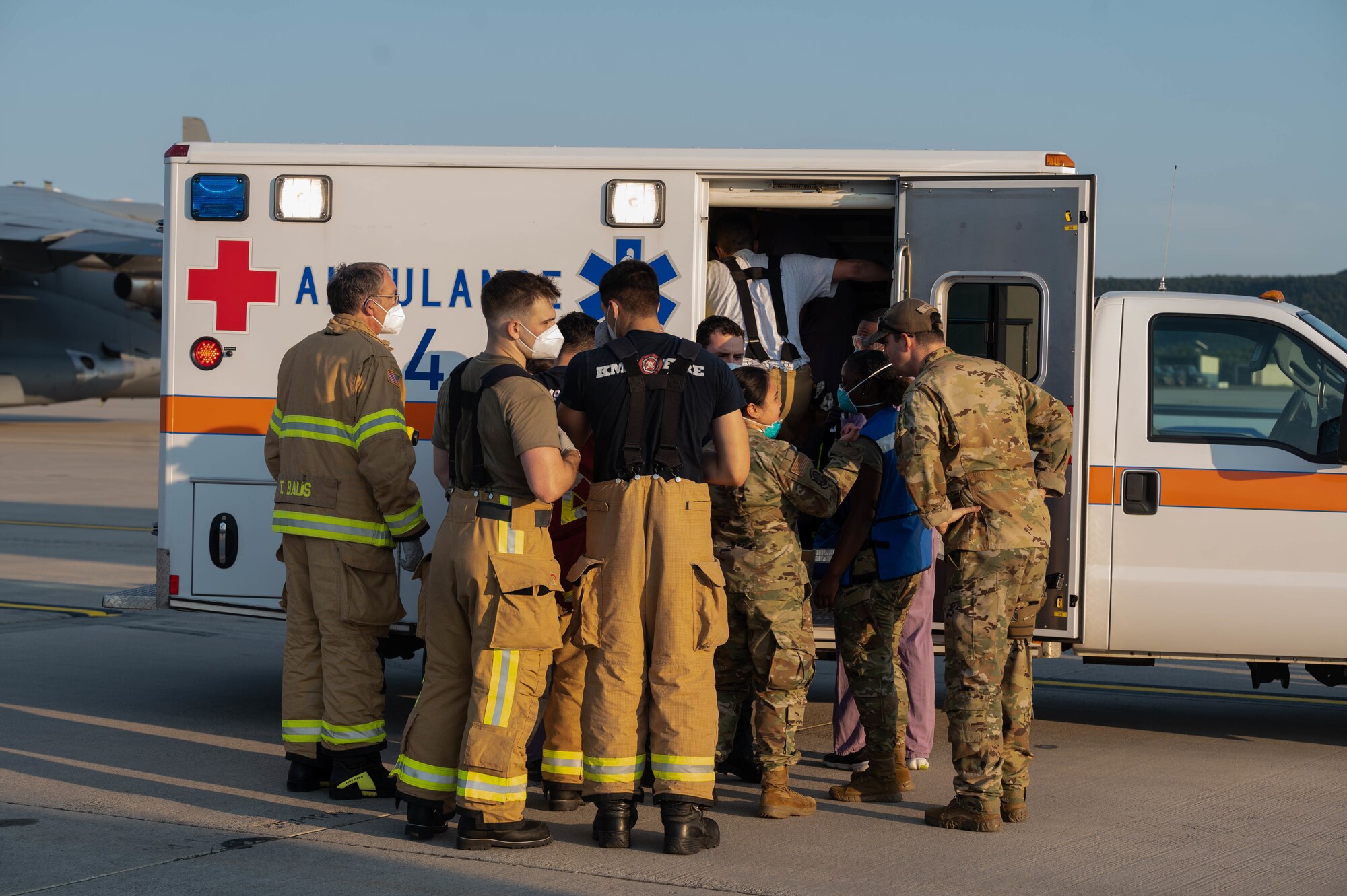 First responders conduct huddle.