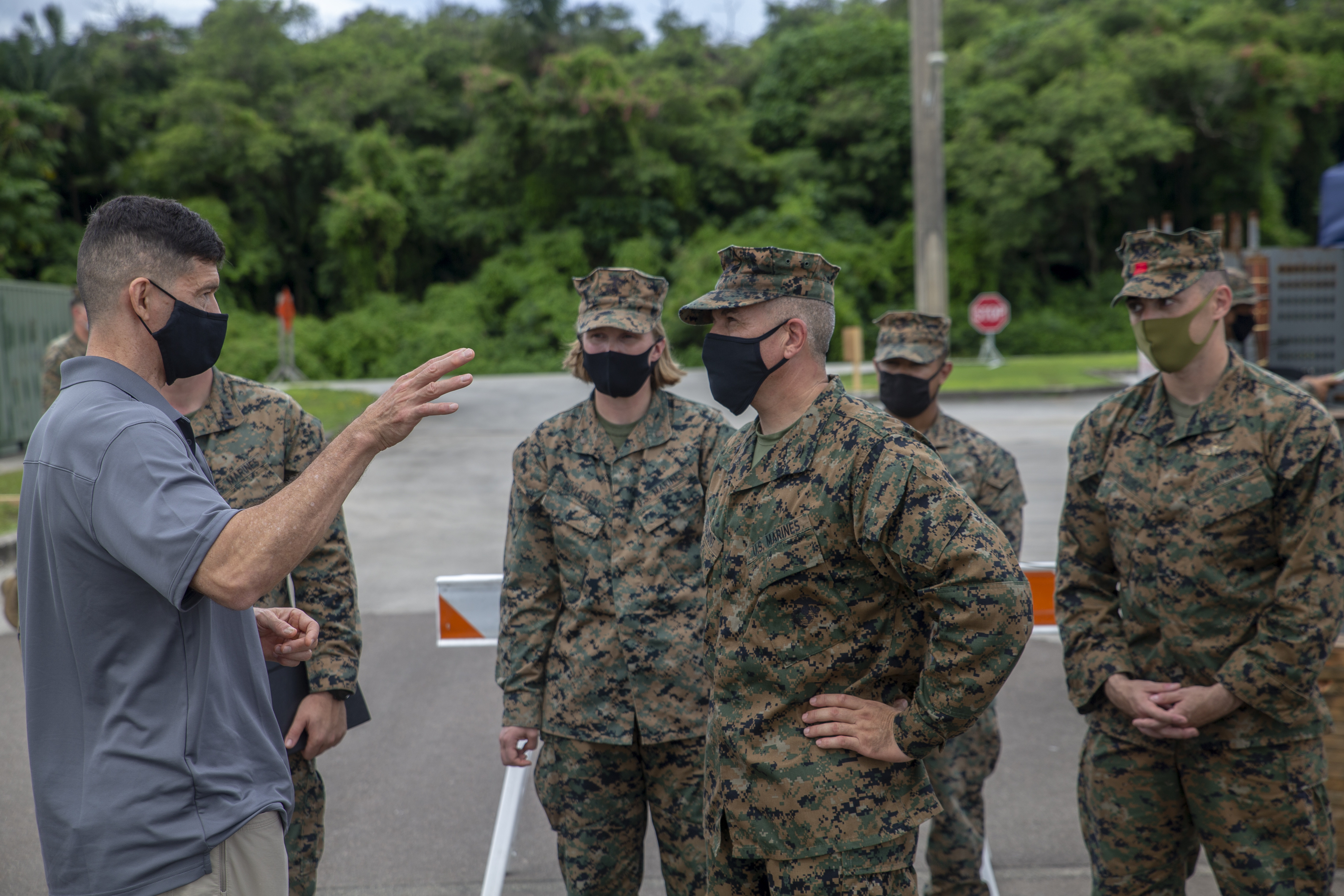 Mark Hashimoto, the Marine Forces Pacific Executive Director, speaks with Combat Logistics Regiment 17 (CLR-17) senior leaders during a visit to U.S. Naval Base Guam, Aug. 12, 2021.