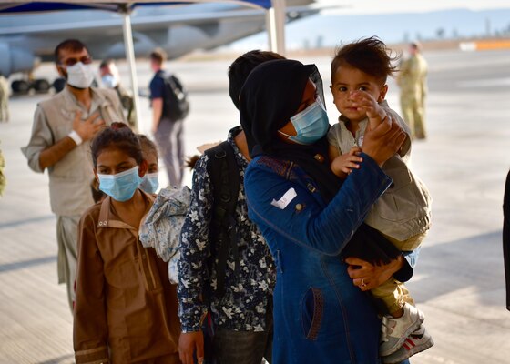 Afghan evacuees arrive at Naval Air Station Sigonella, Aug. 22, 2021.