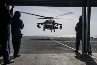 Aircrew with the 1st Battalion, 228th Aviation Regiment, Joint Task Force-Bravo, Soto Cano Air Base, Honduras, conduct deck-landing qualifications aboard the Royal Navy’s Royal Fleet Auxiliary Wave Knight in the Caribbean, Aug. 18, 2021.