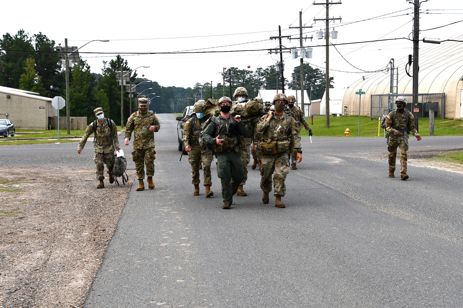 After treating the “injured” Soldiers, medics strap them to stretchers and ruck marching them to the Joint Readiness Training Center Rear Aid Station to continue the training Aug. 6.