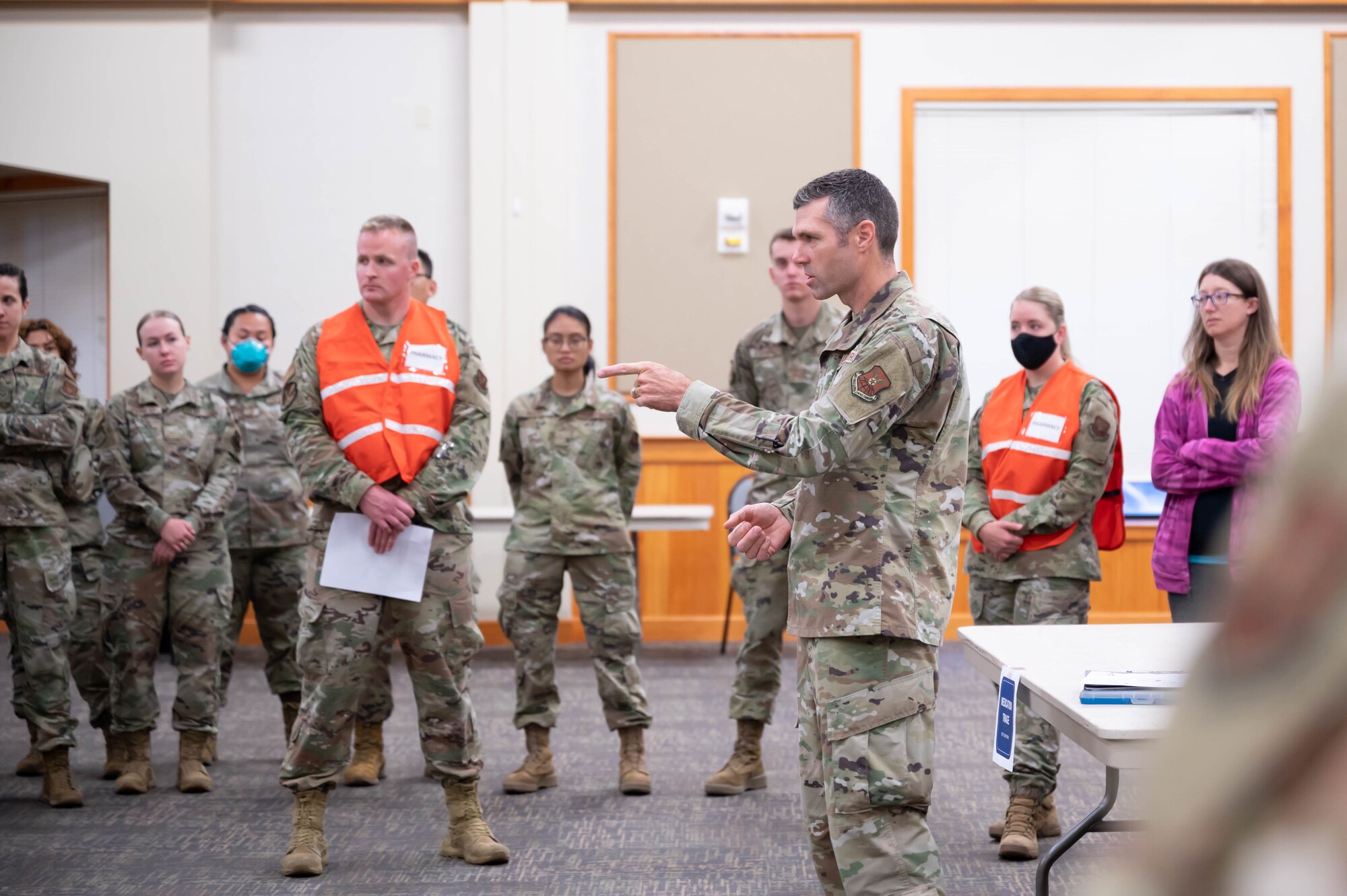 Maj. Landon Hatfield, 341st Medical Group diagnostics and therapeutics flight commander, briefs exercise participants Aug. 19, 2021, at Malmstrom Air Force Base, Mont.