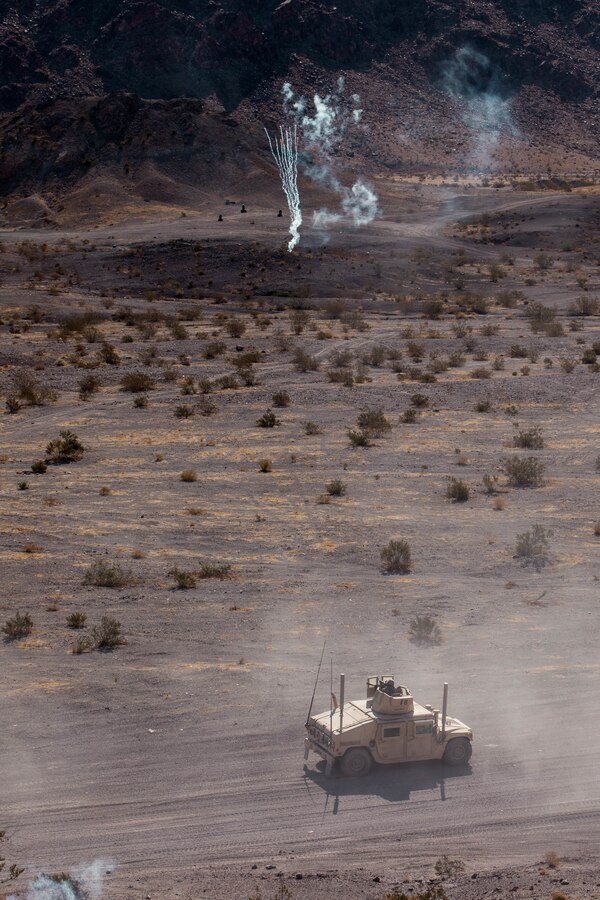 U.S. Marines with Combat Logistics Battalion (CLB) 25 conduct a Motorized Fire and Maneuver Exercise (MFME) during Integrated Training Exercise (ITX) 4-21 at Range 114 on Marine Corps Air Ground Combat Center, Twentynine Palms, California on August 3rd, 2021. The MFME challenges Marines to conduct a live-fire convoy confronted by an unblocked ambush, ensuring Marines from CLB 25 remain combat-ready as they continue to provide vital support to Marine Air Ground Task Force 25 during ITX. (U.S. Marine Corps photo by Lance Cpl. David Intriago)