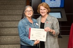 Dr. (Col.) Alicia Madore is pictured with Dr. Suzanne S. Prevost, PhD, RN, FAAN, Dean, Capstone College of Nursing at the University of Alabama, accepting the ‘Innovation in Practice’ Award, on July 30, 2021, for the project titled “Nurse-Led Clinic eHealth Care Coordination for Sexually Transmitted Infections.” (University of Alabama Capstone College of Nursing)