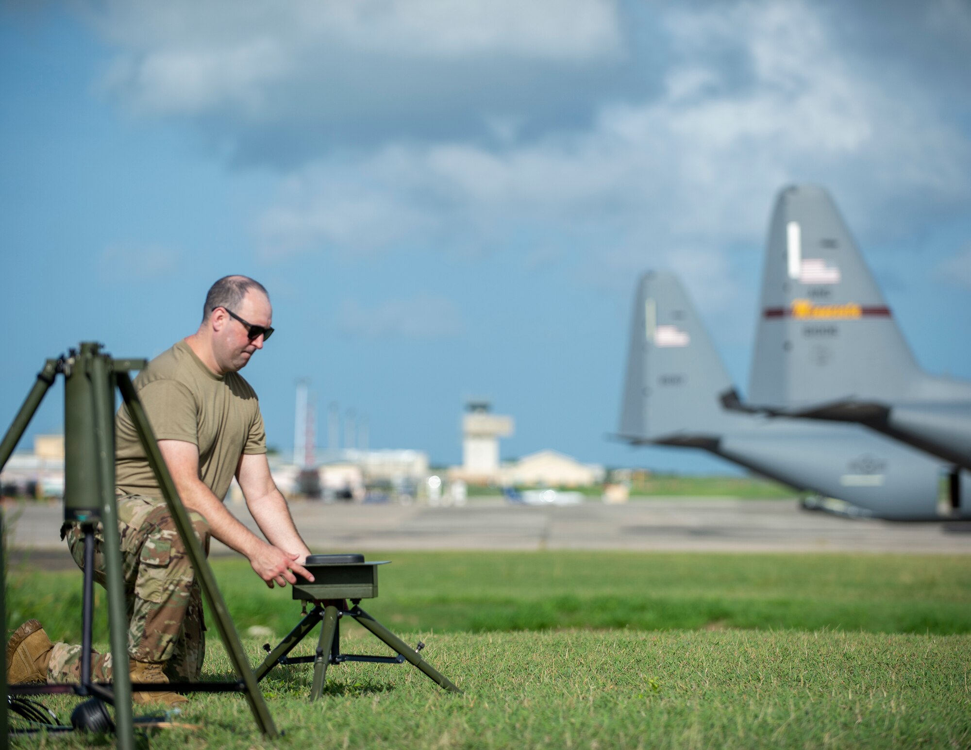 U.S. Air Force Master Sgt. Johnie Smith, 136th Contingency Response Flight, Texas Air National Guard, sets up the TMQ-53 portable weather station in St. Croix, Virgin Islands, Aug. 17, 2021.