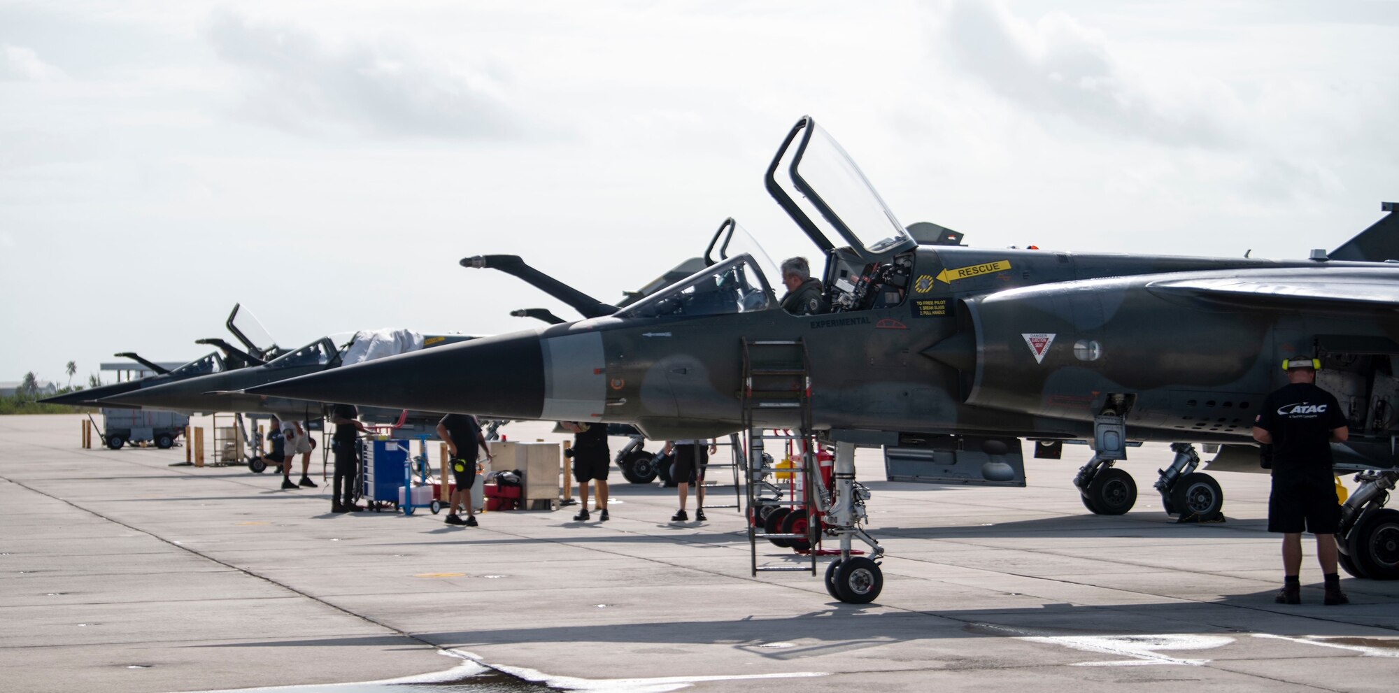 F-1 Mirages from Tyndall Air Force Base, Florida, undergo preflight checks at Naval Air Station Key West, Florida, July 13, 2021. The Airborne Tactical Advantage Company sent their assets to NAS Key West in support of the 43rd Fighter Squadron’s capstone event where the squadron’s student pilots practiced dissimilar combat air training. (U.S. Air Force photo by Brad Sturk)