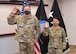 Military members raise their hands to reaffirm their oath to the Space Force
