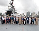 Chief of Navy Reserve Vice Adm. John Mustin, Commander, Navy Reserve Force and Rear Adm. John Schommer pose for a group photo with employer’s, aboard USS Midway Museum during a Navy Employer Recognition Event (NERE) in San Diego, August 20, 2021. Selected employers were nominated by their Navy Reserve employees for supporting their service and especially mobilization for the nation’s response to the COVID-19 pandemic, and invited to attend the one-day event that includes a tour of Midway, a static display of aircraft at Fleet Logistics Support Squadron (VR) 57, an equipment display by Maritime Expeditionary Security Squadron 1 and SEAL Team 17. The Navy Reserve mobilized 2,875 service members in 2020 under the presidential authorization for DoD’s support to the nation’s pandemic. (U.S. Navy photo by Mass Communication Specialist 1st Class Brian P. Caracci)