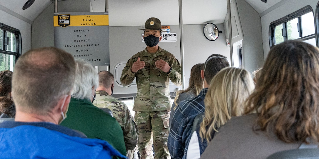 Drill Sergeant and Alaska Army National Guard Soldier Staff Sgt. Kevin Apolinar, assigned to the AKARNG Recruiting Battalion, elaborates on the core Army values to a group of local business representatives from the Anchorage area, Aug. 20, 2021 on Joint Base Elmendorf-Richardson as part of a Maintenance Showcase highlighting the AKARNG's Partnership for Youth Success program. (U.S. Army National Guard photo by Sgt. Seth LaCount)