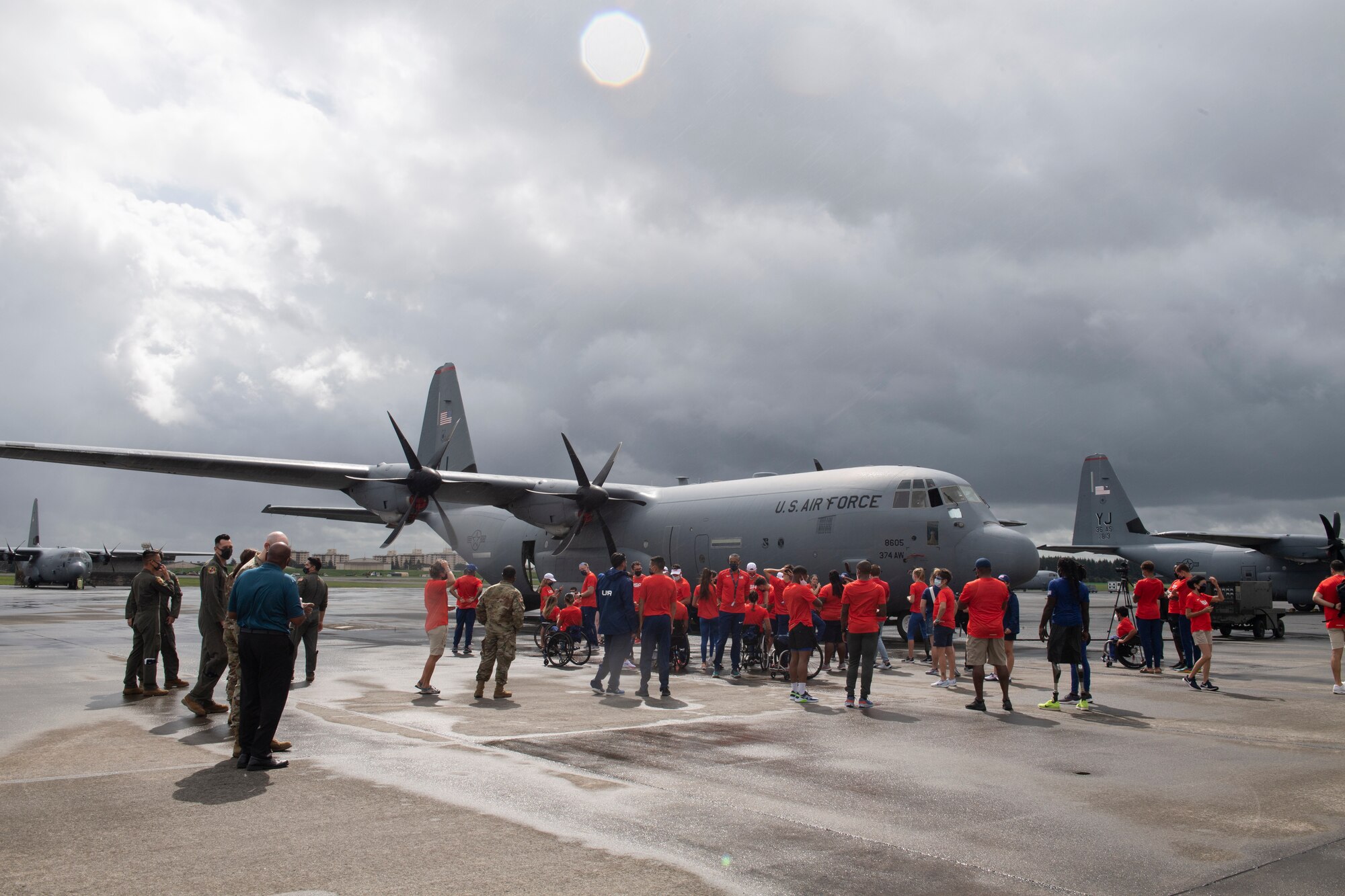U.S. Paralympians tour a C-130J Super Hercules at Yokota Air Base, Japan, Aug. 18, 2021, before competing in the 2020 Summer Paralympic games in Tokyo.