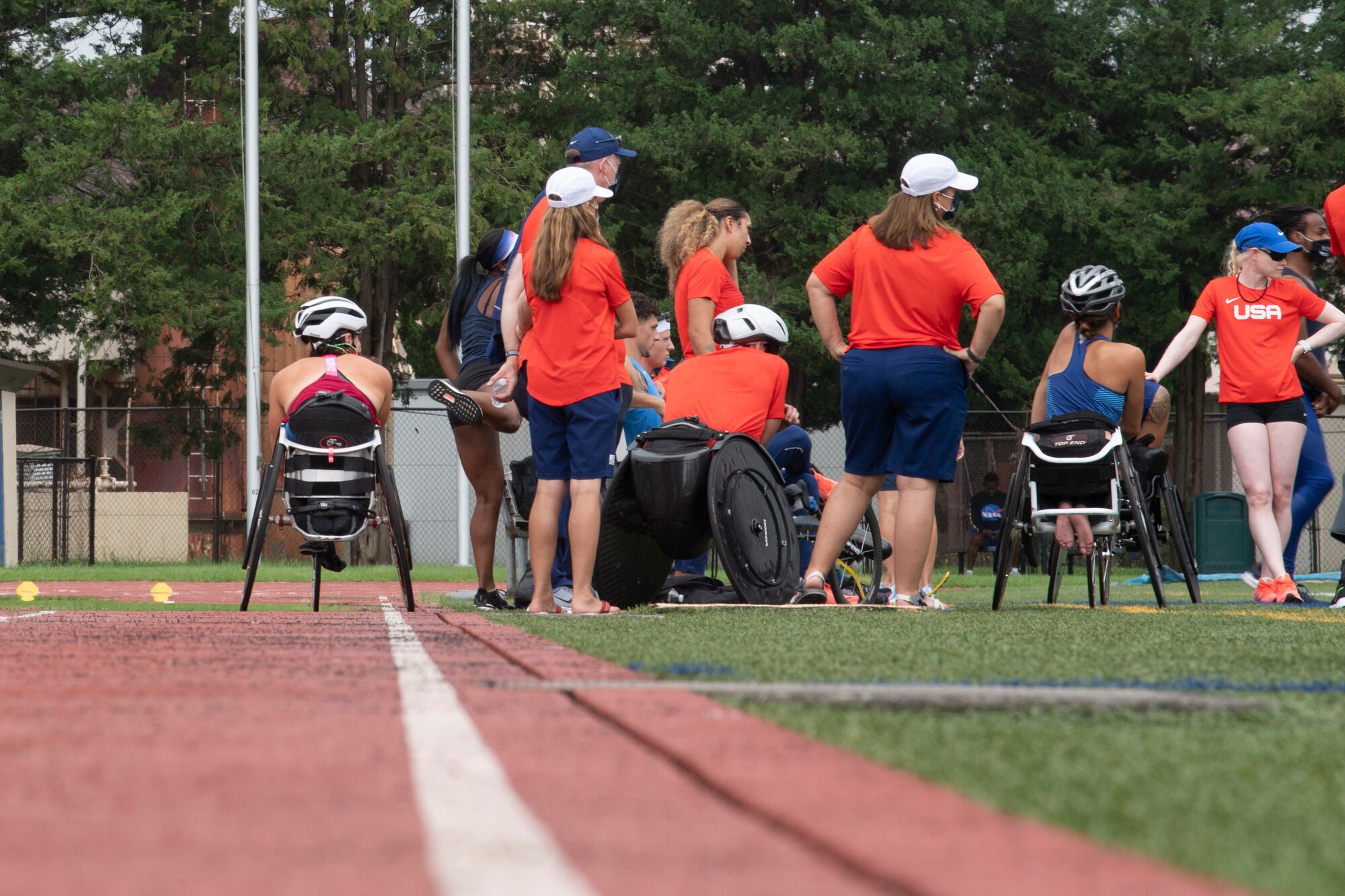 U.S. Para track and field team members hold a meeting prior to a practice at Yokota Air Base, Japan, Aug. 18, 2021.
