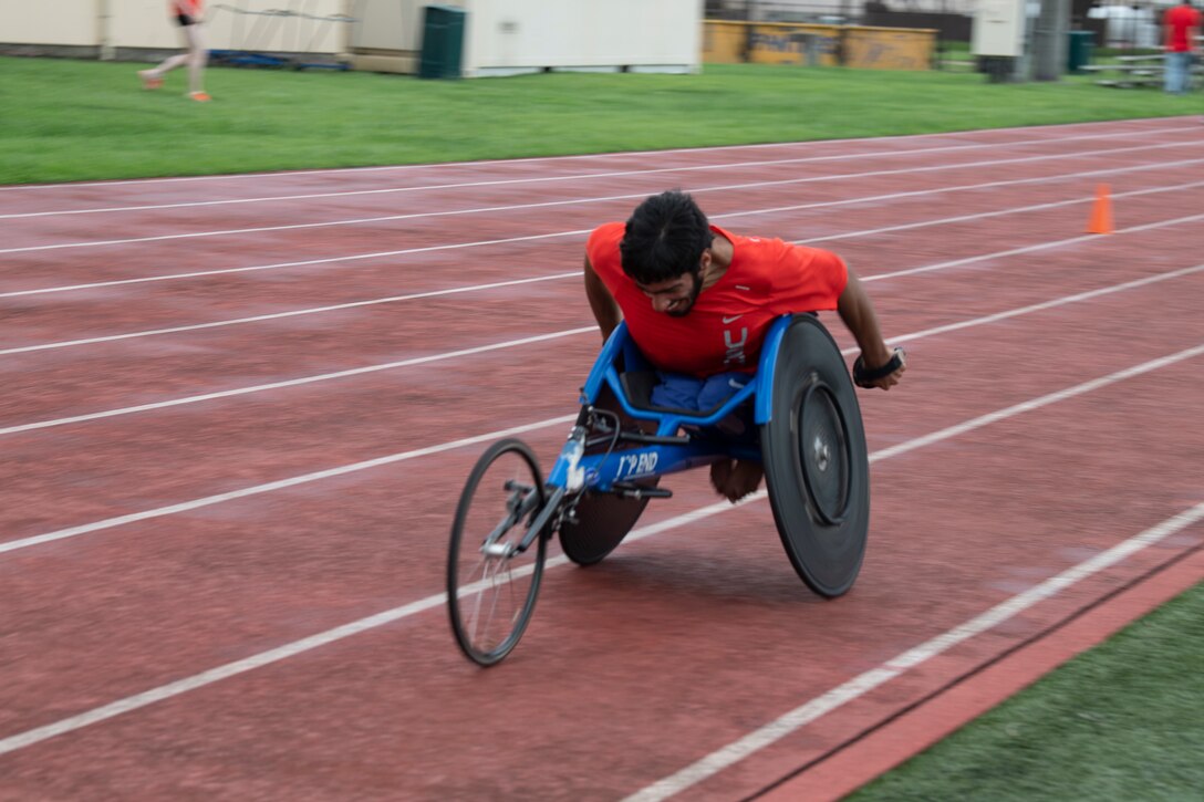 Gianfranco Iannotta, U.S. Para track and field team member, races around the track during a practice session at Yokota Air Base, Japan, Aug. 18, 2021.