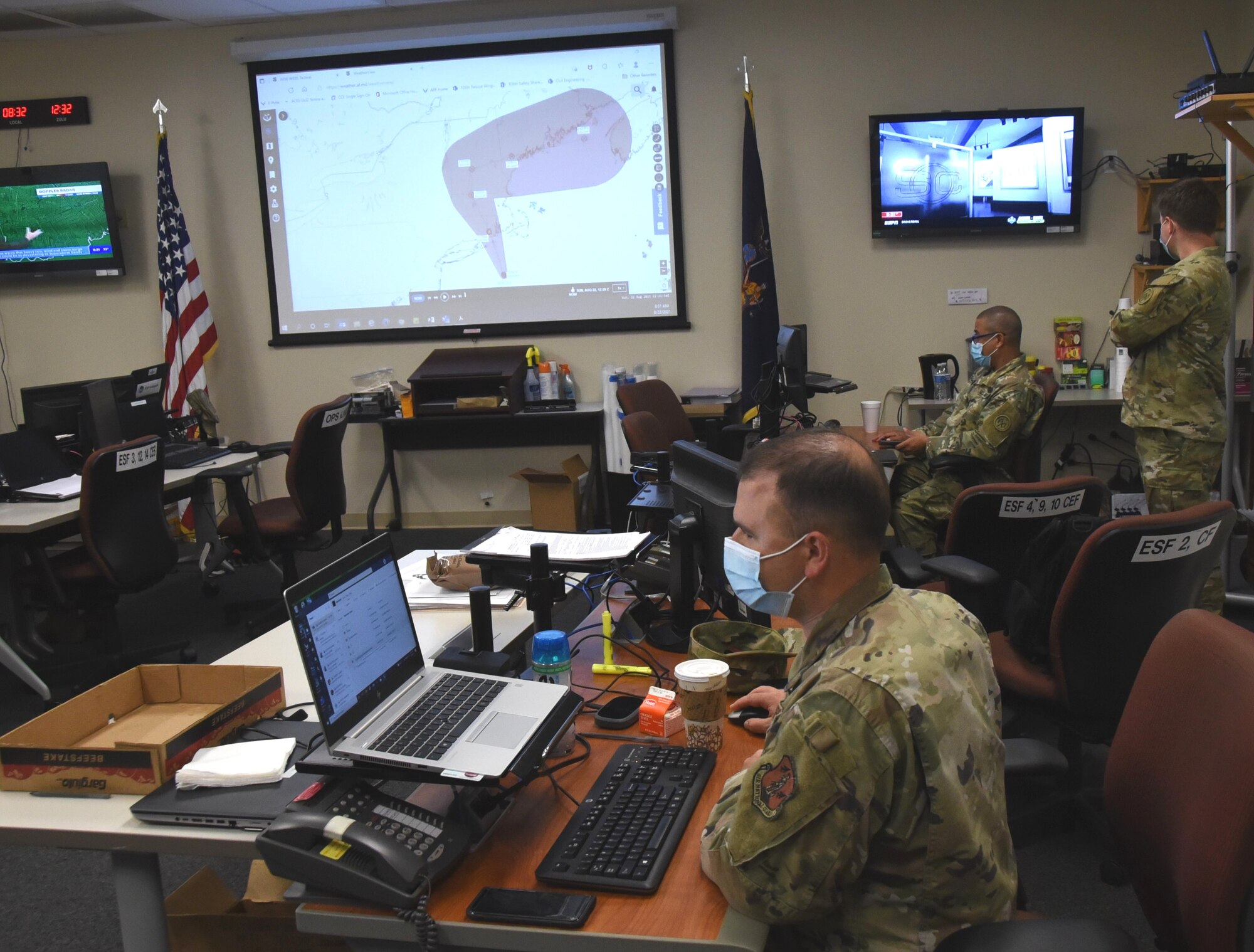 New York National Guard members monitor the approach of Hurricane Henri in the emergency operations center at the F.S. Gabreski Air National Guard Base in Westhampton Beach, New York, Aug. 22, 2021. The New York National Guard activated 500 Soldiers and Airmen on Long Island, New York City and in the Hudson Valley and Albany areas to assist as needed.