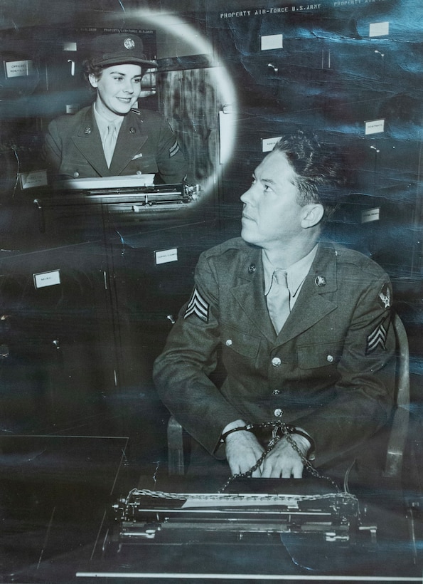 A WWII era recruitment poster featuring Lorraine Vogelsang, a Women’s Army Corps veteran, sits inside a frame at her Cincinnati, Ohio, home, Aug. 19, 2021. Vogelsang served in the WAC from February 1943 until August 1945. (U.S. Air Force photo by Wesley Farnsworth)