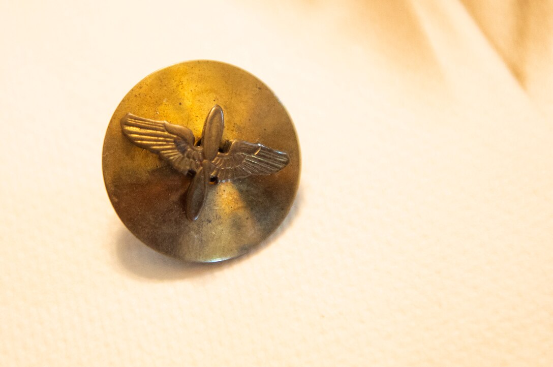 A Prop and Wings Pin belonging to Lorraine Vogelsang, a Women’s Army Corps veteran, sits on display inside her Cincinnati, Ohio, home, Aug. 19, 2021. Vogelsang served in the WAC from February 1943 until August 1945. (U.S. Air Force photo by Wesley Farnsworth)
