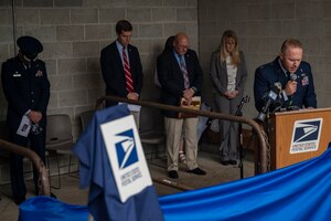 Capt. Jeremy Caskey, 911th Airlift Wing chaplain, delivers the invocation during a dedication ceremony renaming the post office in Hookstown, Pennsylvania, Aug. 16, 2021. The post office was renamed after a fallen Airman, Staff Sgt. Dylan Elchin, who was killed by a roadside bomb in Afghanistan’s Ghazni province in November 2018.
