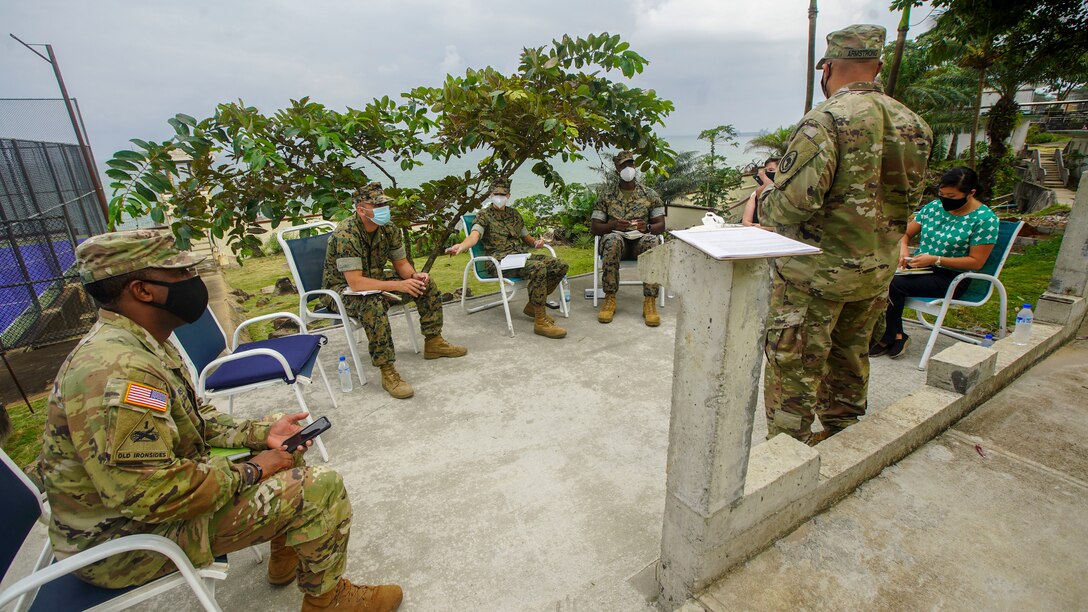 U.S. Marines from Marine Corps Forces Europe and Africa (MARFOREUR/AF), U.S. Army Soldiers from the U.S. Embassy in Liberia, Regina Jun, Program Office Deputy Director of the U.S. Agency for International Development (USAID), and Sunshine Ison, Director of International Narcotics and Law Enforcement Affairs (INL), discuss the upcoming Women, Peace, and Security (WPS) engagement in Monrovia, Liberia, July 29, 2021. U.S. Marines from MARFOREUR/AF travelled to West Africa to conduct an event in support of the WPS program as part of a national effort to promote the meaningful contributions of women in defense and security sectors around the world. WPS focuses on improving effectiveness of foreign policy and efforts by proactively integrating the needs and perspectives of women, while also empowering them to contribute their talents and energies to international peace, security, and prosperity. (U.S. Marine Corps photo by Sgt. James Bourgeois/Released)