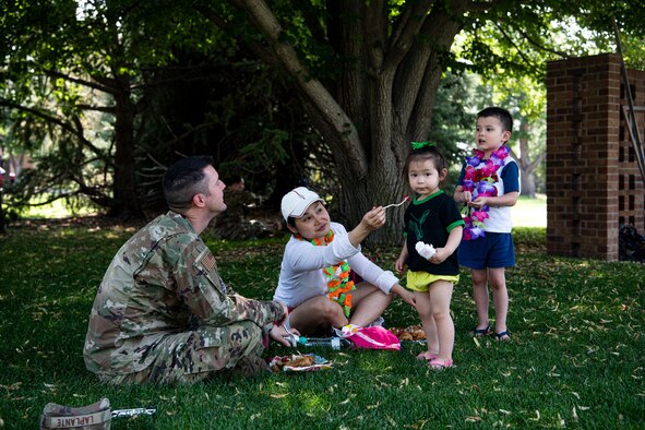 PETERSON SPACE FORCE BASE, Colo. --  The Peterson Chapel Team hosted the Luau on the Lawn, a Hawaiian themed resiliency event to give Airmen and Guardians a chance to take a break from work during the duty day to enjoy free food and play games at Peterson Space Force Base, Colorado, Aug. 13, 2021.   (U.S. Space Force photo by Airman 1st Class Joshua Fontenot)