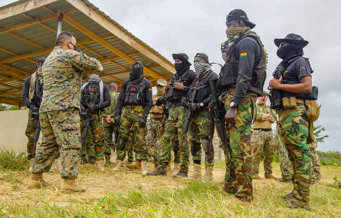 A U.S. Marine with Combined Task Force-68 teaches a class at the Naval Training Command (NAVTRAC) in Nutekpor-Sogakope, Ghana, Aug. 12, 2021. Combined Task Force-68, deployed aboard the USS Hershel “Woody” Williams, conducted Theatre Security Cooperation training with the Ghanaian Special Boat Squadron at NAVTRAC to enhance operational capabilities and readiness throughout Western Africa. (U.S. Marine Corps photo by Sgt. James Bourgeois)