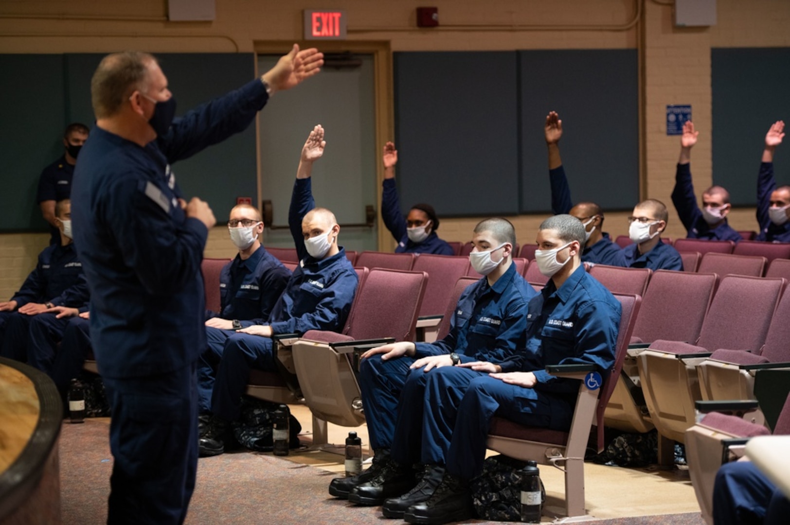 U.S. Coast Guard Vice Commandant Adm. Charles Ray and Deputy Master Chief Petty Officer of the Coast Guard Master Chief Charles “Rob” Bushey mentor the recruits of Charlie and Delta 200 inside of the Ida Lewis Auditorium during their visit to U.S. Coast Guard Training Center Cape May, N.J., Feb. 27, 2021. The Coast Guard’s recruit mentorship program is designed to provide our newest Coast Guard women and men with the opportunity to learn from and ask questions to highly-skilled and experienced Coast Guard service members who have excelled in today’s modern fleet. (U.S. Coast Guard photo by Petty Officer 2nd Class Shannon Kearney)