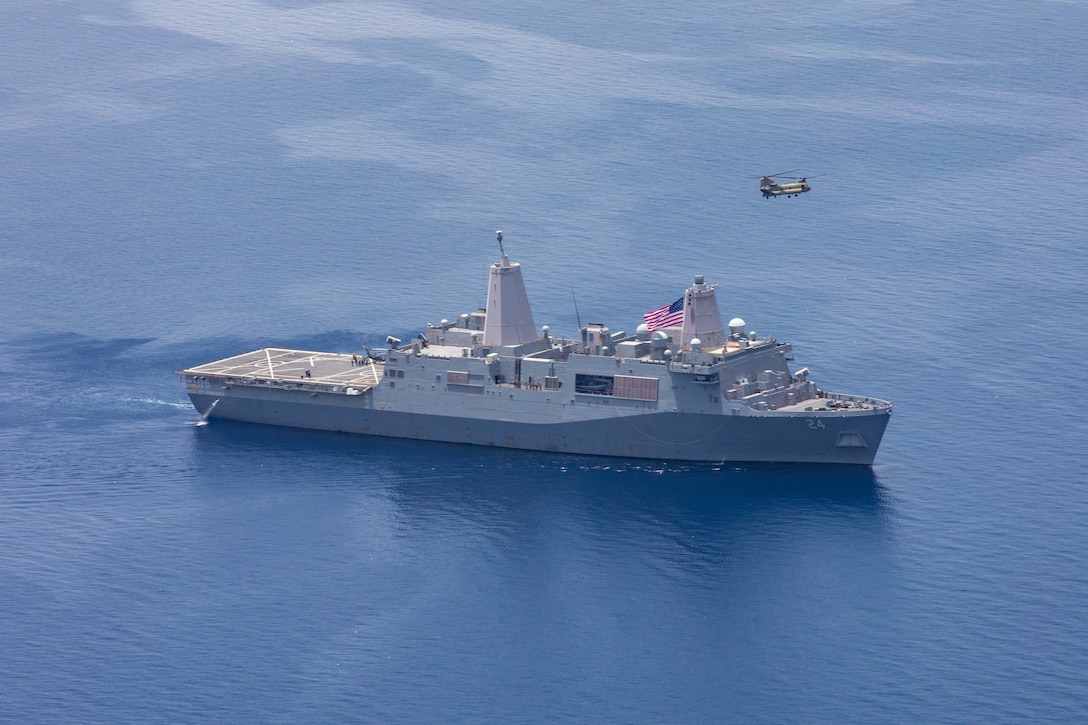USS Arlington (LPD 24) conducts flight operations with a U.S. Army CH-47 Chinook helicopter, assigned to Bravo Company, 1st Battalion, 228th Aviation Regiment in support of Joint Task Force-Haiti, Aug. 22, 2021.