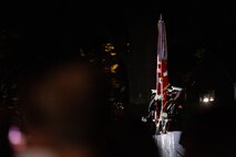 Marines with the Official U.S. Marine Corps Color Guard present the National Ensign during the Friday Evening Parade at Marine Barracks Washington, Aug. 20, 2021.