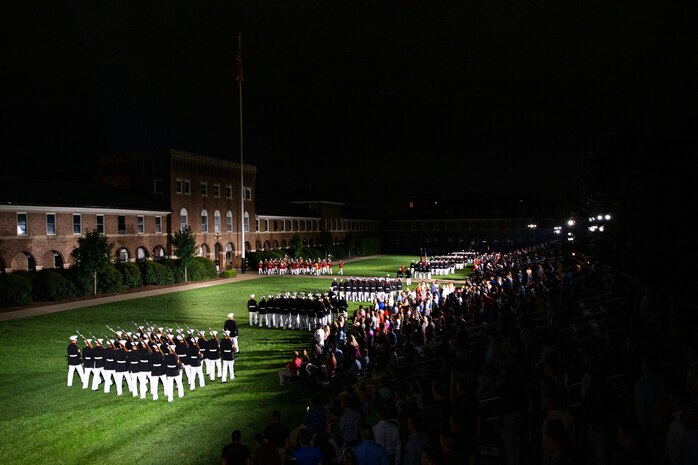 Marines with Marine Barracks Washington conduct “pass in review” during the Friday Evening Parade at MBW, Aug. 20, 2021.
