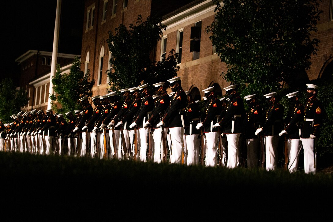 Marines with Marine Barracks Washington “fix bayonets” during the Friday Evening Parade at MBW, Aug. 20, 2021. The guest of honor for the evening was Mr. Robert J. Conte III, Chief of the Metropolitan Police Department, and the hosting official was Lt. Gen. David A. Ottignon, Deputy Commandant for Manpower and Reserve. (U.S. Marine Corps photo by Lance Cpl. Allen T. Sanders)