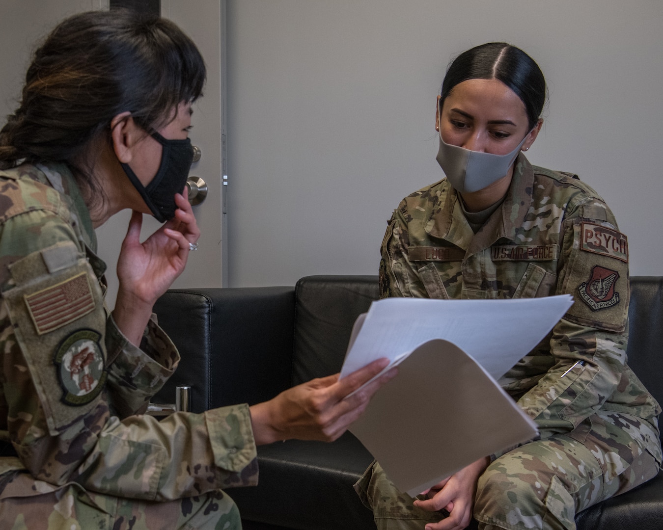 Two service members talking