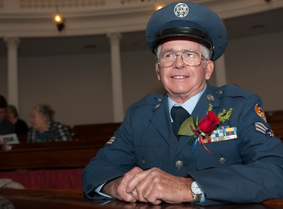 Wesley Chandler sits while waiting for the start of an awards ceremony being held at the state house in Montpelier, Vt., Nov. 12, 2013. Chandler was one of 28 Vermonters to receive an award from the Republic of Korea, for his service during the Korean War. (U.S. Air National Guard photo by Staff Sgt. Sarah Mattison)