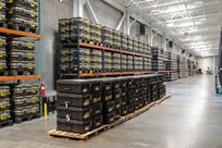 Palettes with a shipment of multiple integrated laser engagement system (MILES) gear waits to be loaded directly onto a truck at the new 63,000-square-foot Training Support Center (TSC) opened at Fort Indiantown Gap in early 2020. The facility consolidates the operations previously located in six World War II-era buildings into one state-of-the-art facility. (U.S. Army National Guard photo by Staff Sgt. Zane Craig)