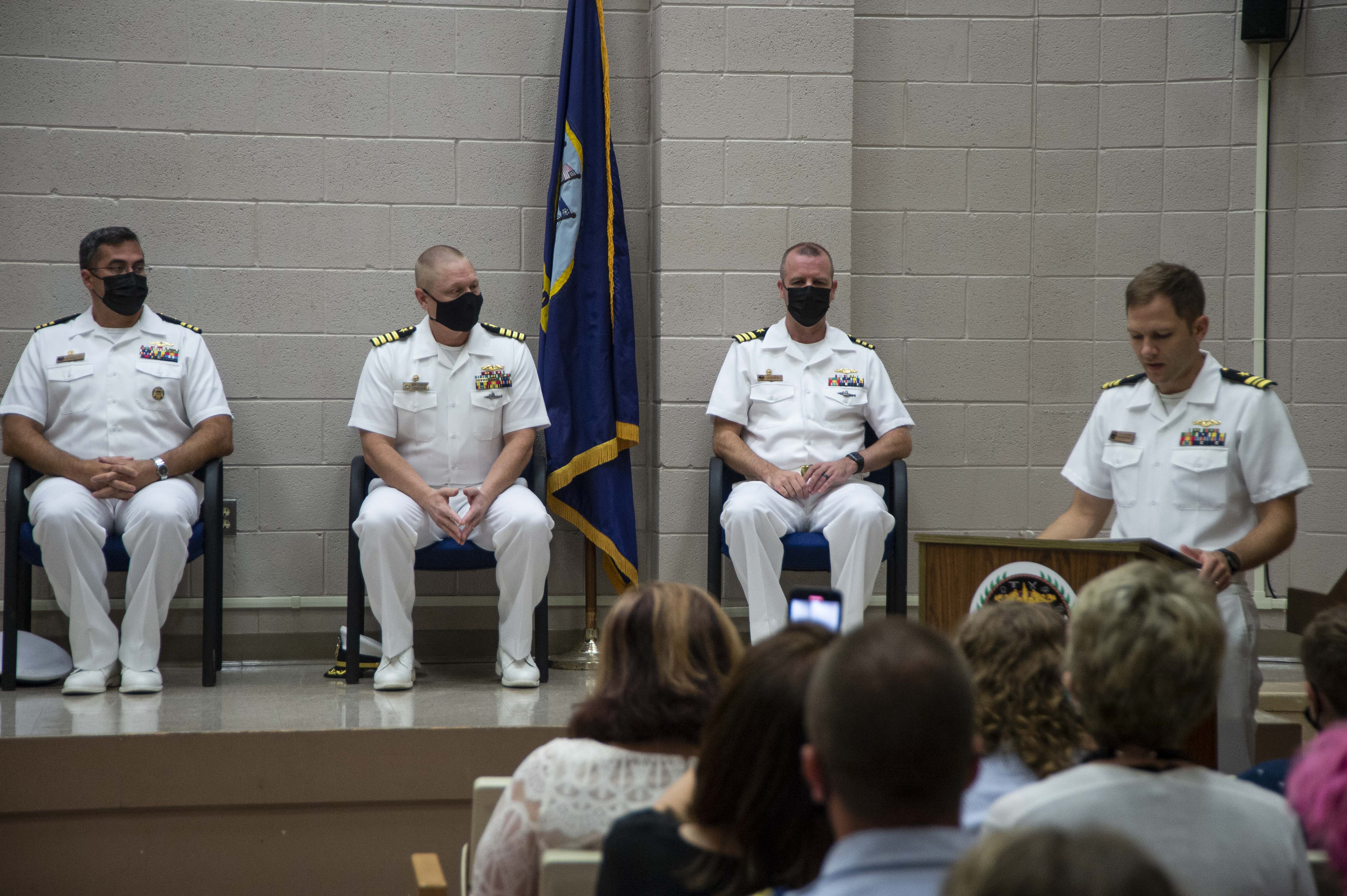 Lt. Cmdr. Nicholas Tuuk, right, executive officer of Pre-commissioning unit New Jersey (SSN 796) introduces the official party during a change-of-command ceremony at Submarine Learning Facility Norfolk in Norfolk, Va., Aug. 20, 2021.