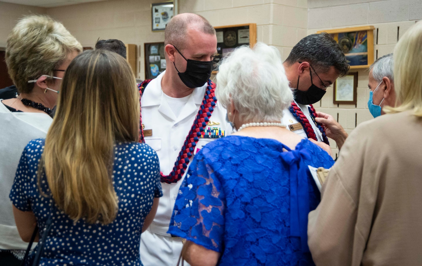 Cmdr. Joseph Spinks, left, and Cmdr. Carlos Otero, commanding officer of Pre-commissioning unit New Jersey (SSN 796) greet friends and family after a change-of-command ceremony held at Submarine Learning Facility Norfolk in Norfolk, Va., Aug. 20, 2021.