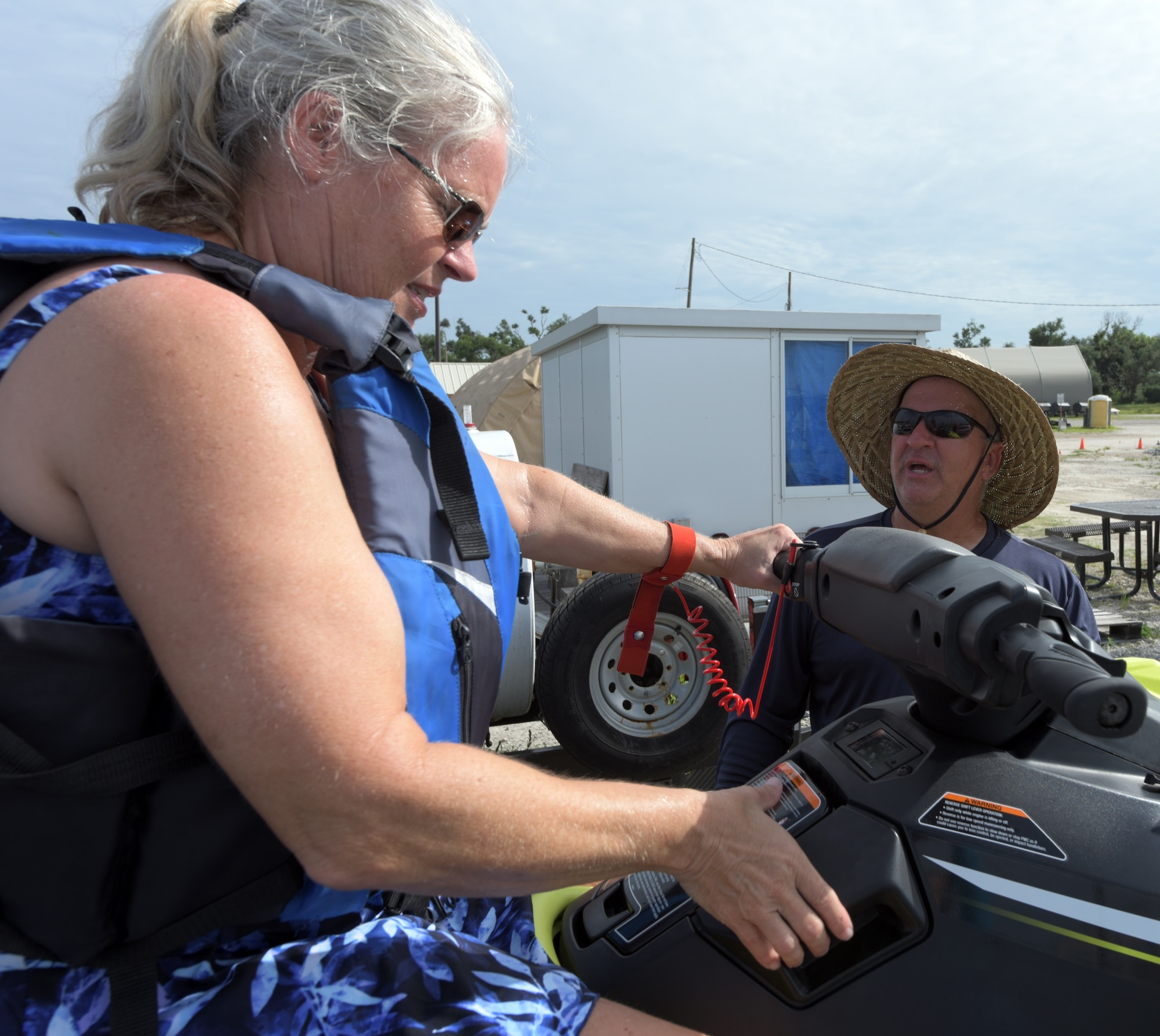 Woman prepares to ride jet ski