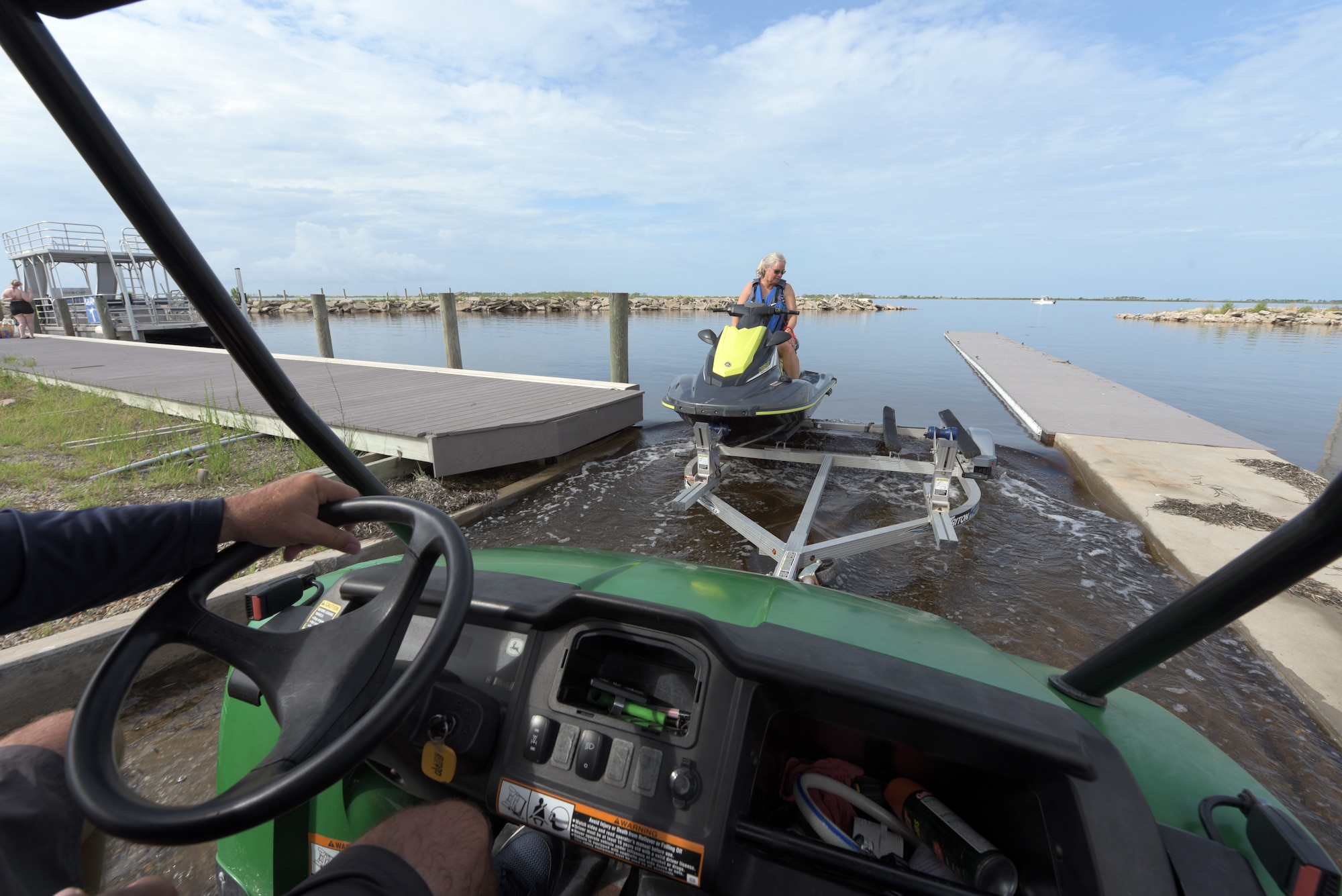 Woman rides jet ski