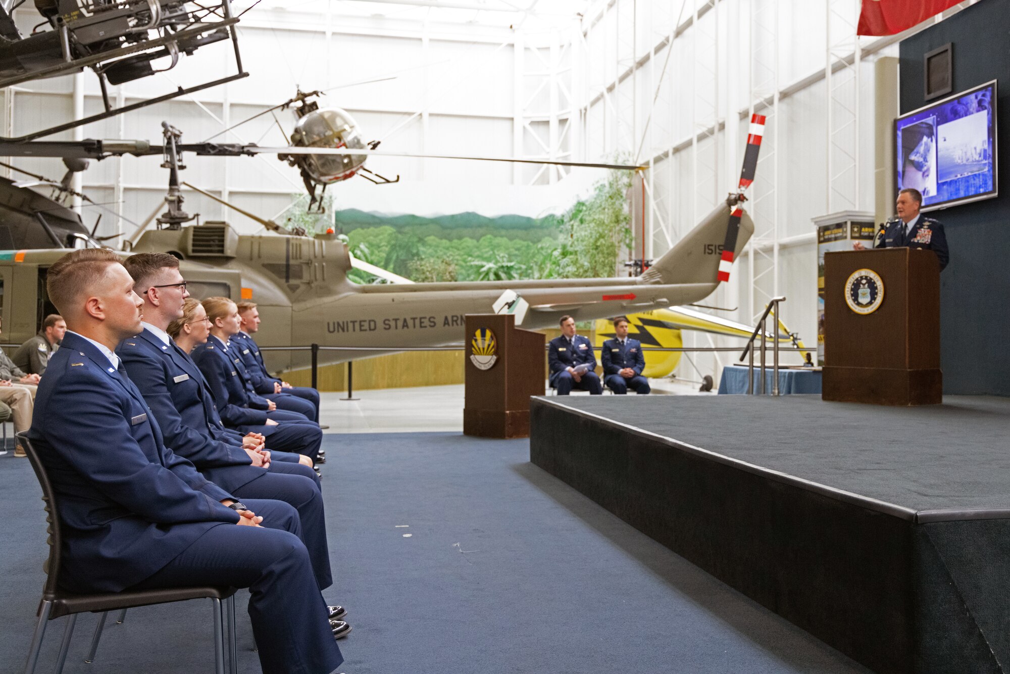 Air Force officers attend a graduation ceremony.