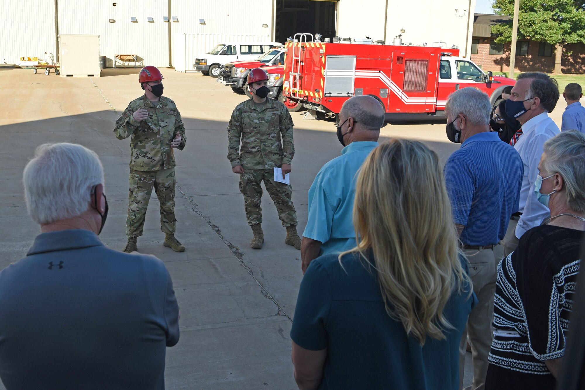 U.S. Air Force Master Sgt. Richard Bradley Jr., 312th Training Squadron Department of Defense Louis F. Garland Fire Academy apprentice course flight chief, briefs civic leaders on training aspects at the academy on Goodfellow Air Force Base, Texas, Aug. 24, 2021. The fire academy trains fire protection personnel for the DOD, partnered allies and San Angelo community. (U.S. Air Force photo by Senior Airman Abbey Rieves)