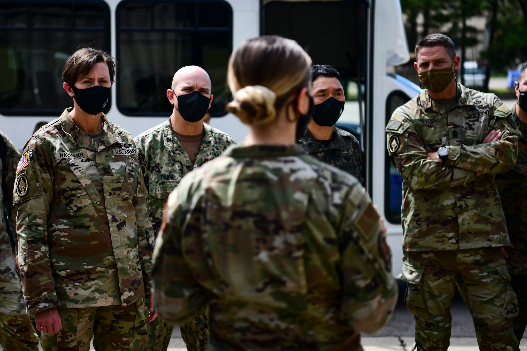 An Airmen briefs commanders on COVID.