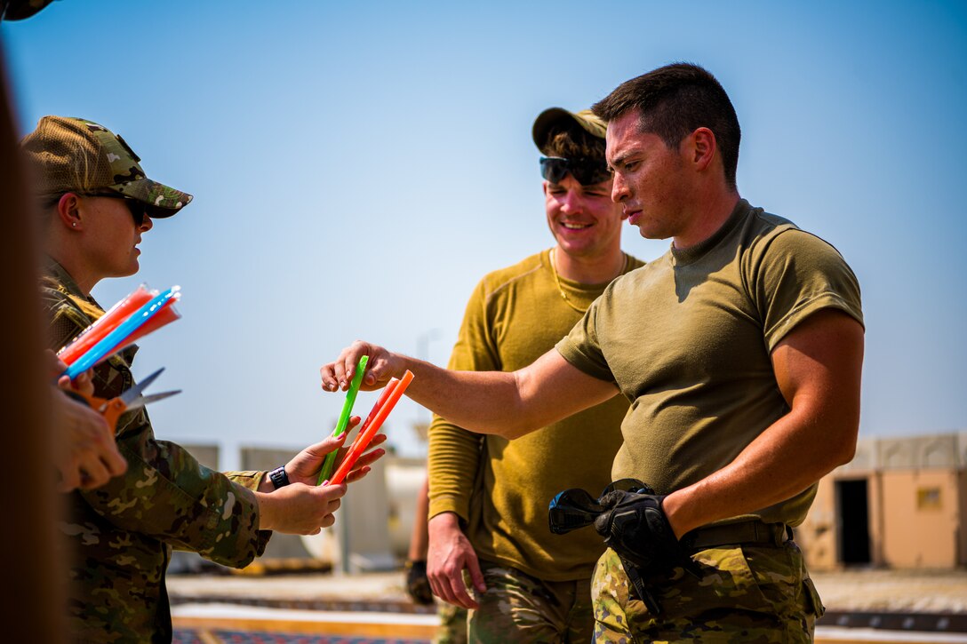 U.S. Air Force Airmen from the 1st Expeditionary Civil Engineer Group (ECEG) and 380th Expeditionary Civil Engineer Squadron lay foundation for expansion at Al Dhafra Air Base, United Arab Emirates, Aug. 18, 2021.