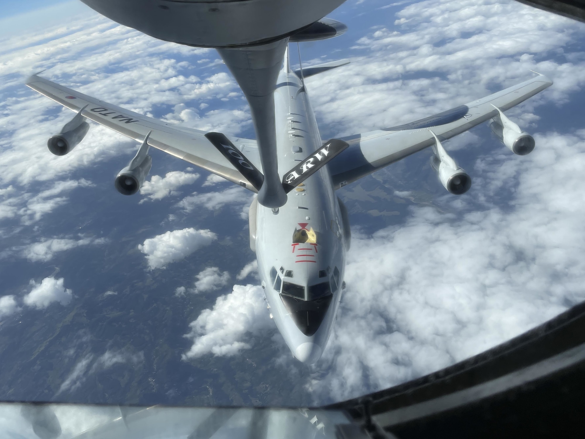 A NATO E-3 Sentry aircraft assigned to Geilenkirchen NATO Air Base, Germany, approaches a U.S. Air Force KC-135 Stratotanker aircraft to receive fuel over Europe Aug. 19, 2021. Training with NATO forces enhances the collective security of the European continent. (U.S. Air Force photo by Senior Airman Joseph Barron)