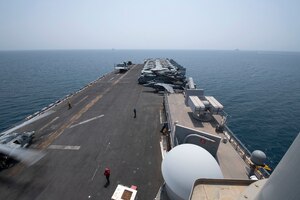 STRAIT OF HORMUZ (Aug. 23, 2021) Amphibious assault ship USS Iwo Jima (LHD 7) transits the Strait of Hormuz, Aug. 23. Iwo Jima is deployed to the U.S. 5th Fleet area of operations in support of naval operations to ensure maritime stability and security in the Central Region, connecting the Mediterranean and Pacific through the western Indian Ocean and three strategic choke points.