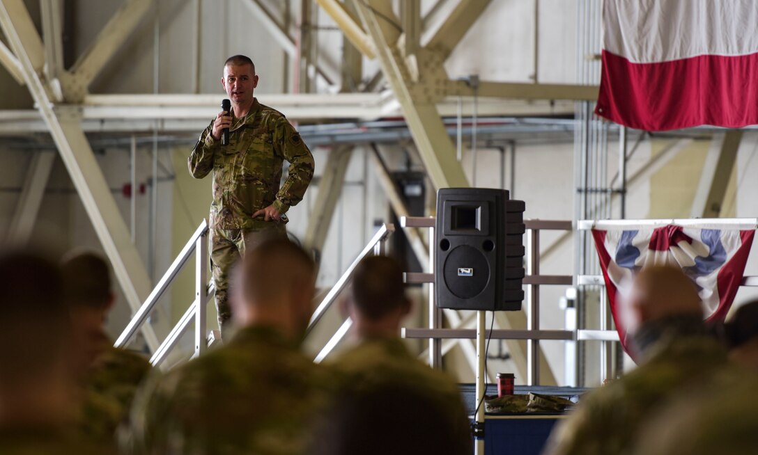 U.S. Air Force Col. Craig Giles, 92nd Maintenance Group commander, gives opening remarks before the start of the Maintenance Olympics event at Fairchild Air Force Base, Washington, Aug. 20, 2021.