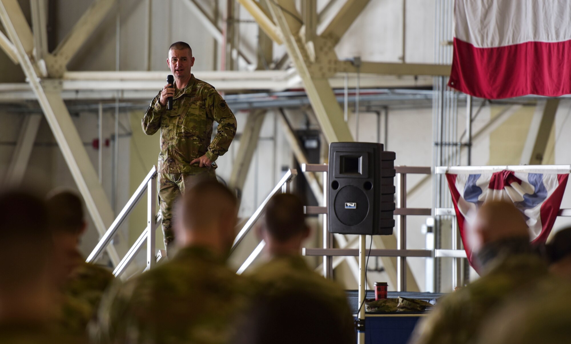 U.S. Air Force Col. Craig Giles, 92nd Maintenance Group commander, gives opening remarks before the start of the Maintenance Olympics event at Fairchild Air Force Base, Washington, Aug. 20, 2021.