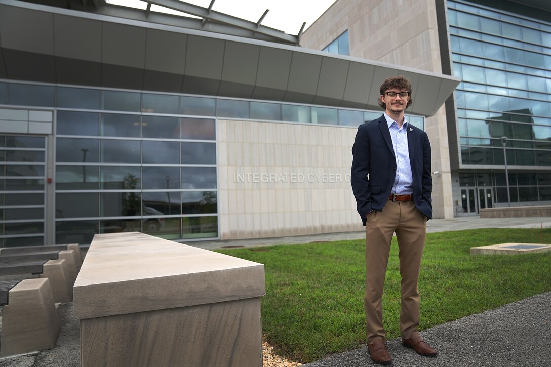Ethan Marshall, U.S. Air Force Premier College Intern, stands near the U.S. Cyber Command Integrated Cyber Center at Fort George G. Meade, Md., Aug. 18, 2021.
