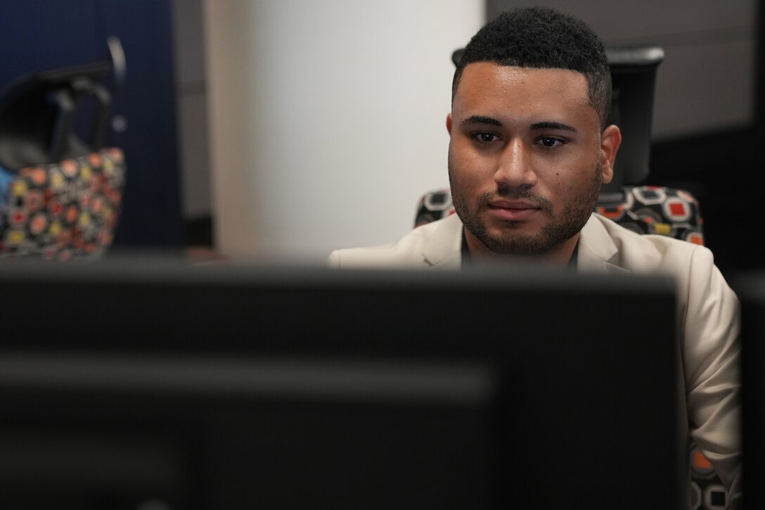 Jimmy Rodriguez, U.S. Air Force Premier College Intern, works at U.S. Cyber Command, Fort George G. Meade, Md., Aug. 18, 2021.