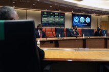 U.S. Air Force Premier College Interns, Ethan Marshall, Jimmy Rodriguez, and Aura Teasley, recall their efforts while working at U.S. Cyber Command to Gen. Paul M. Nakasone, USCYBERCOM commander and National Security Agency director, at Fort George G. Meade, Md., Aug. 18, 2021.