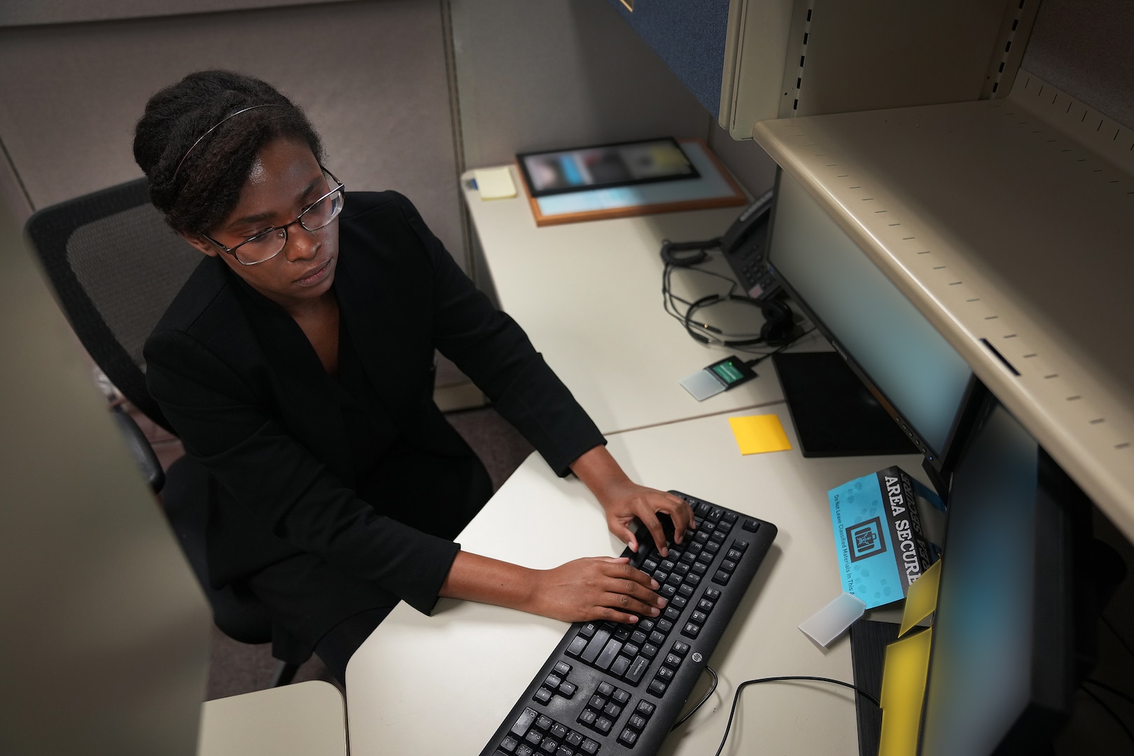 Aura Teasley, U.S. Air Force Premier College Intern, works at U.S. Cyber Command, Fort George G. Meade, Md., Aug. 18, 2021.