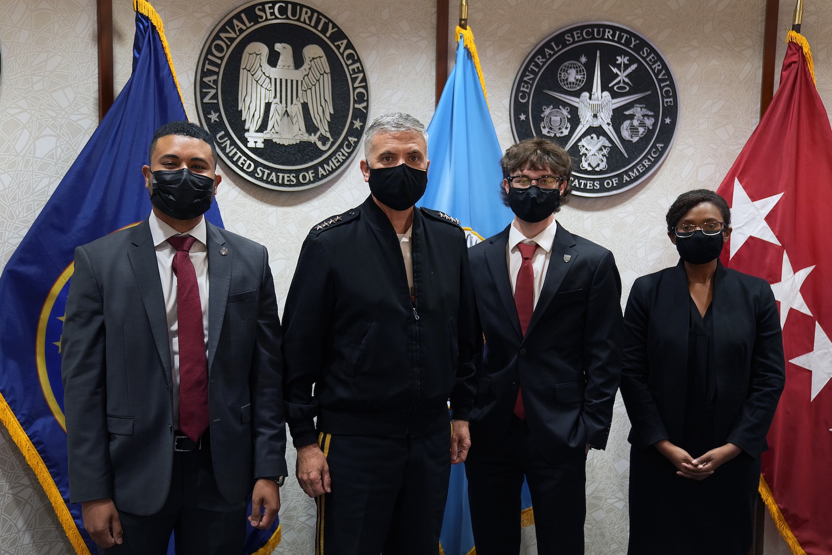 U.S. Air Force Premier College Interns, stand with Gen. Paul M. Nakasone, U.S. Cyber Command commander and National Security Agency director, at Fort George G. Meade, Md., Aug. 18, 2021.